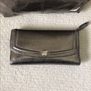 Metallic coach wallet with check book holder